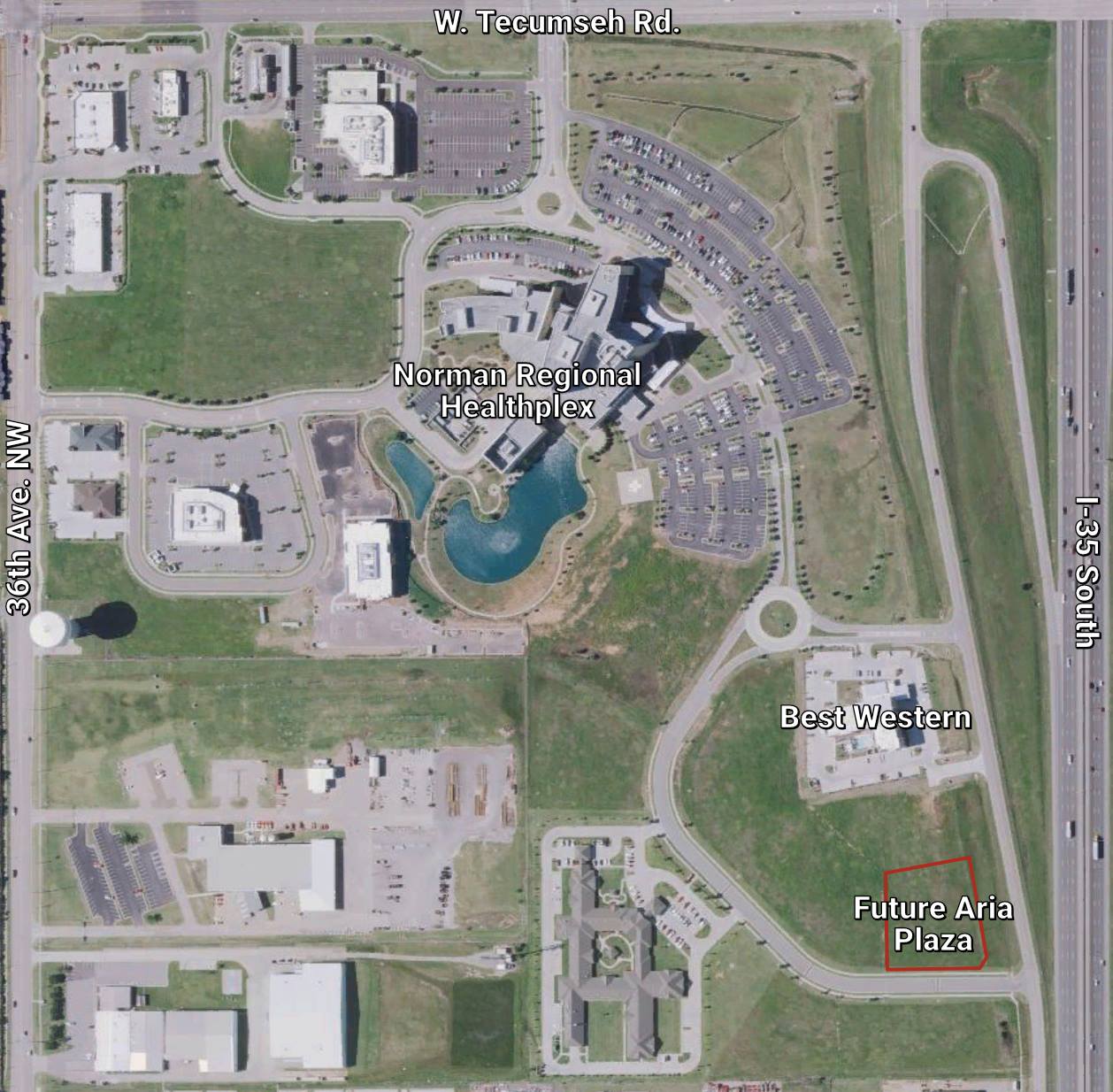 Labeled aerial of the future Aria Plaza parcel outlined in red near the Norman Regional HealthPlex, a Best Western, and I-35 South off 36th Avenue NW.